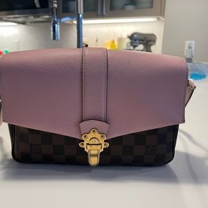 Pre owned Louis Vuitton Clapton Crossbody is guaranteed 100% authentic.